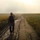 Man walking on road